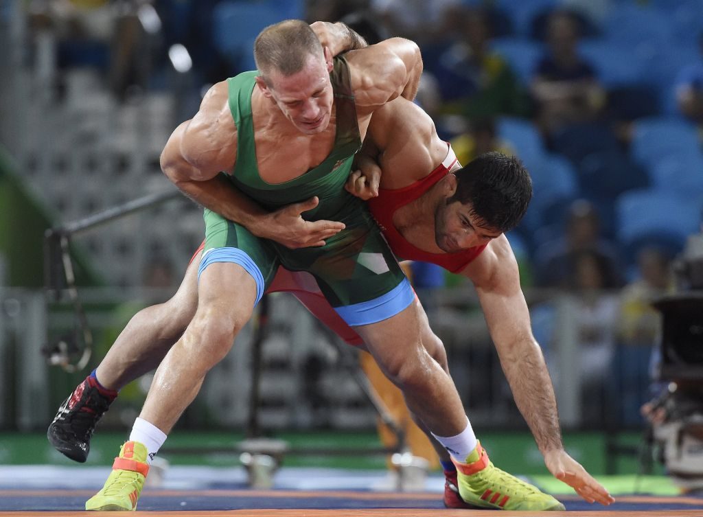 Bácsi Péter (zöldben) és az iráni Szaid Abdevali elleni bronzmeccsén (kép: MTI / Kovács Tamás)